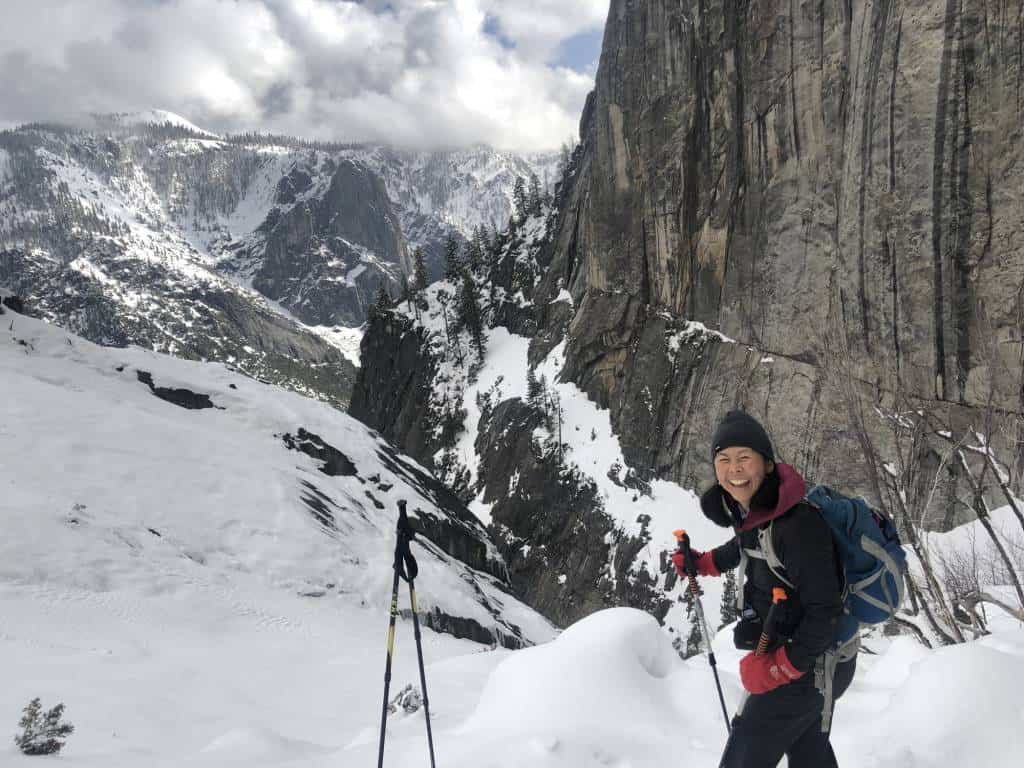 Theresa in the snow laughing. Yosemite Falls Trail